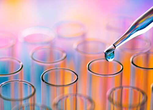 Scientific test tubes with a rainbow hue